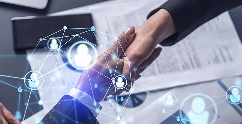 Recruitment concept to hiring of a new talented specialists for international company. Handshake to sign in of employment agreement. Social media hologram icons. Women in business concept.